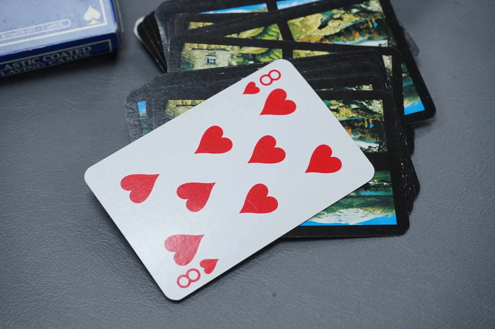 An Italian Sorrento ware playing card case, 12cm high